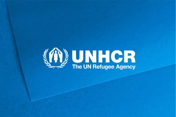 UNHCR white logo on blue background