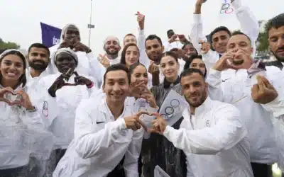 Largest-ever Refugee Olympic Team makes its entrance as Paris Games open