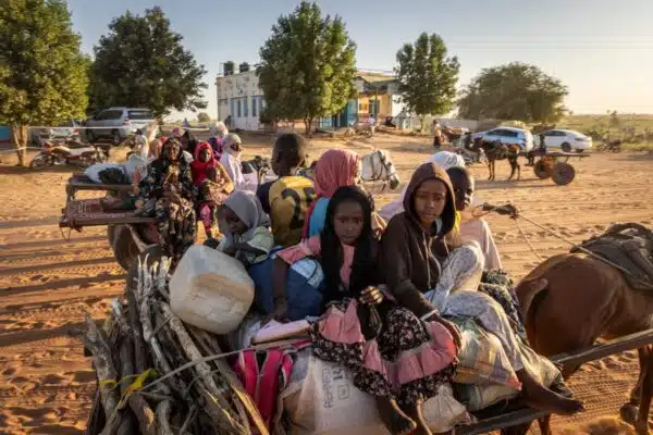 A Sudanese family packed into the back of